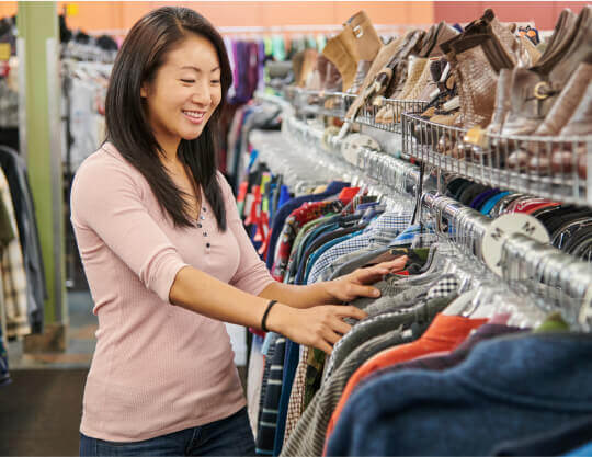 A customer looking at clothes